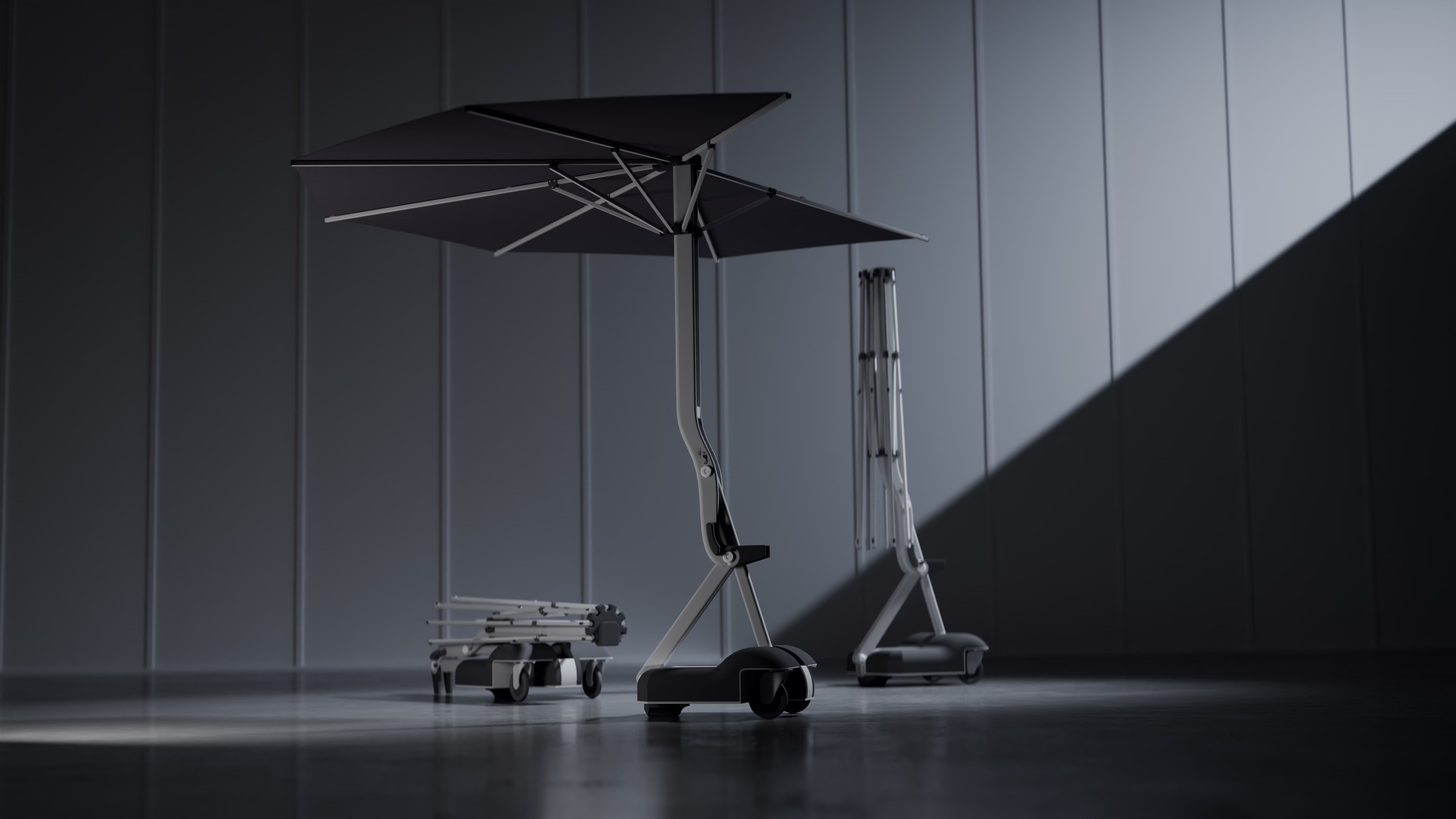 Airone open in a hall, with a second one folded flat and a third raised but closed