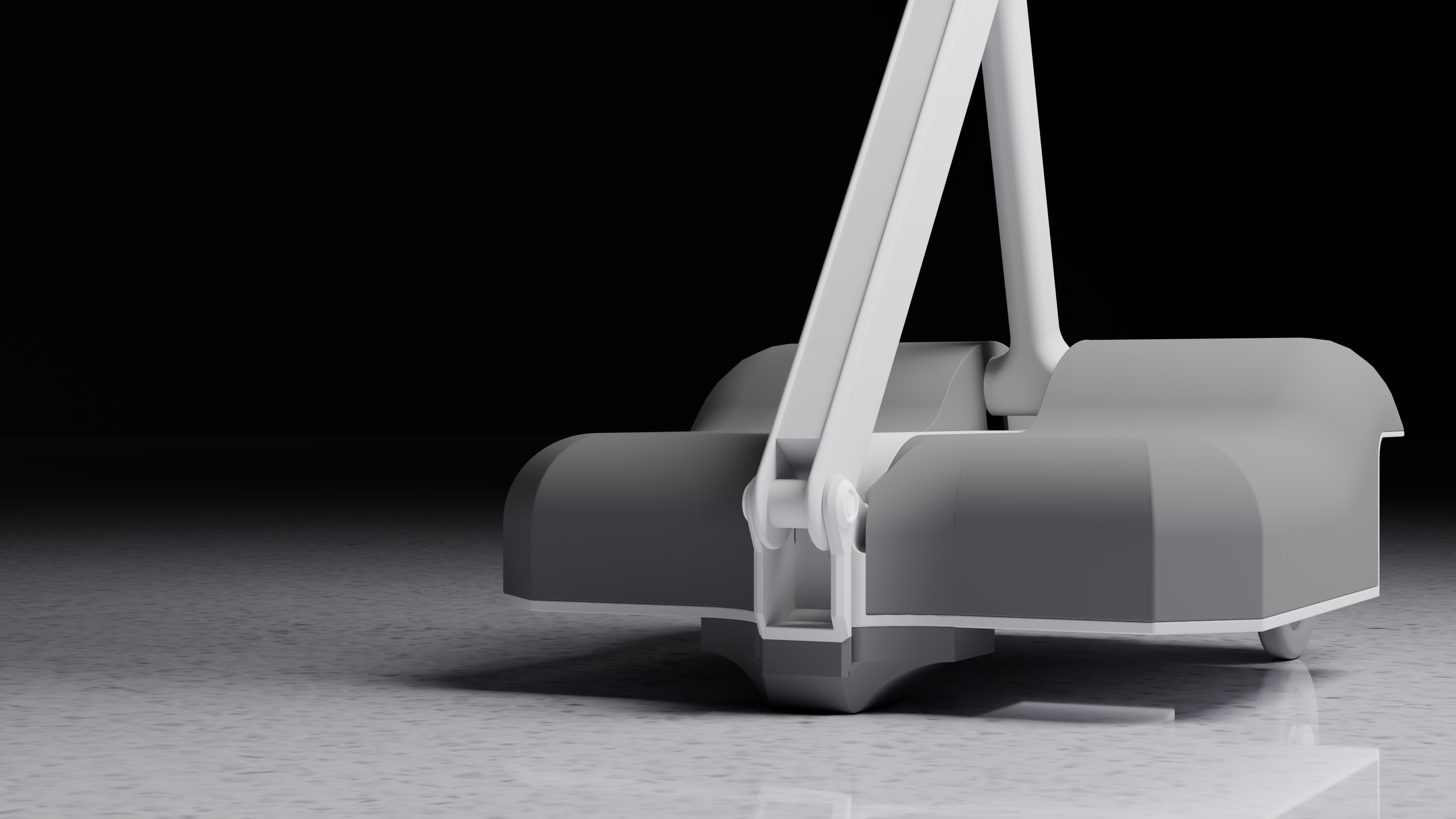 The base, with its wheels and the foot of the arm