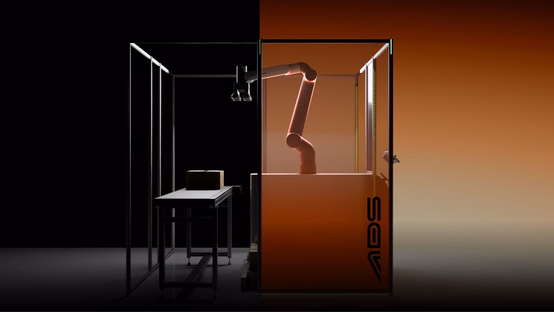 Mechanè half in the dark and half lit in orange: the bare frame on one side, the closed island with the ABB GoFa on the other